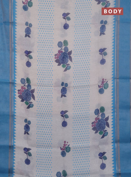Art Linen saree pastel blue and blue with allover floral prints and temple design rettapet zari woven border