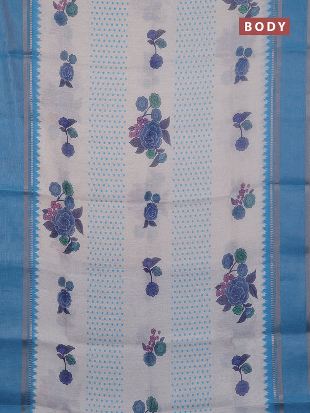 Art Linen saree pastel blue and blue with allover floral prints and temple design rettapet zari woven border