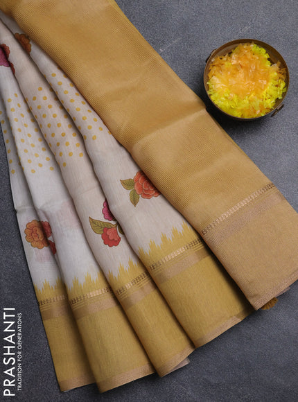 Art Linen saree mustard yellow with allover floral prints and temple design rettapet zari woven border