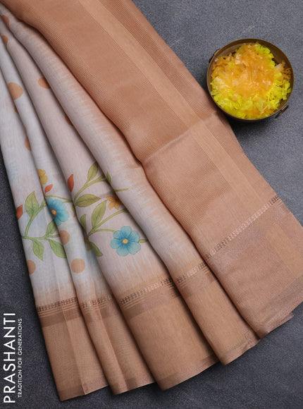 Art Linen saree pale orange with allover floral prints and temple design rettapet zari woven border
