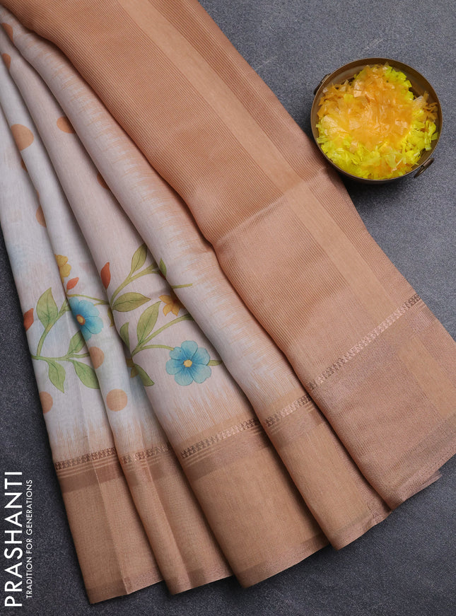 Art Linen saree pale orange with allover floral prints and temple design rettapet zari woven border