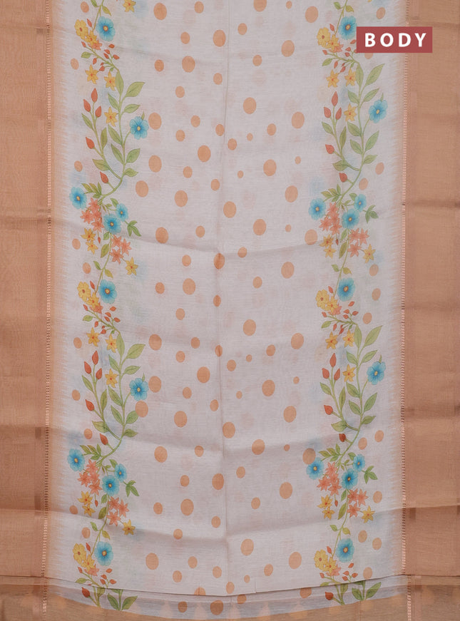 Art Linen saree pale orange with allover floral prints and temple design rettapet zari woven border