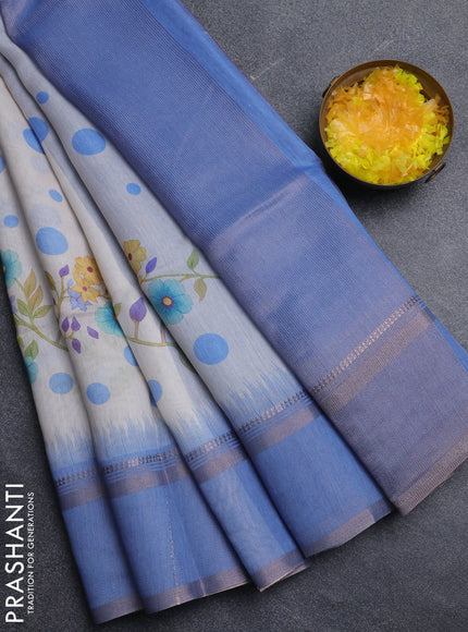 Art Linen saree pastel blue with allover floral prints and temple design rettapet zari woven border