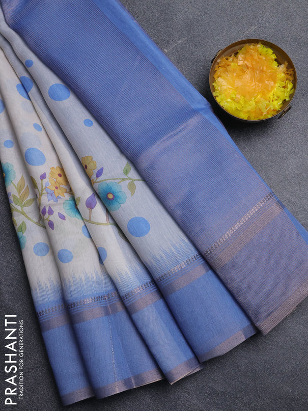 Art Linen saree pastel blue with allover floral prints and temple design rettapet zari woven border