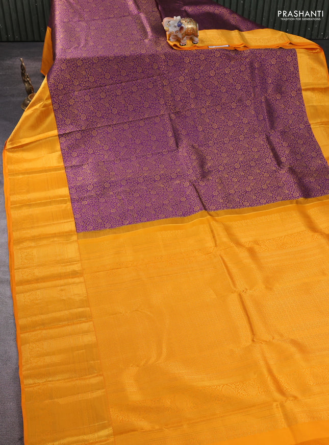 Pure kanchipuram silk saree deep purple and orange with allover zari woven brocade weaves and long zari woven border
