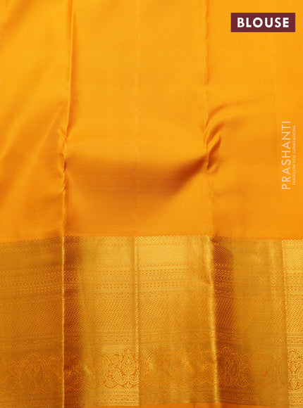 Pure kanchipuram silk saree deep purple and orange with allover zari woven brocade weaves and long zari woven border