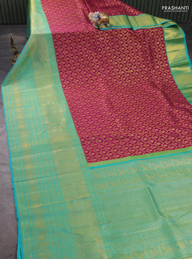 Pure kanchipuram silk saree dark magenta and teal blue with allover zari woven brocade weaves and long zari woven border