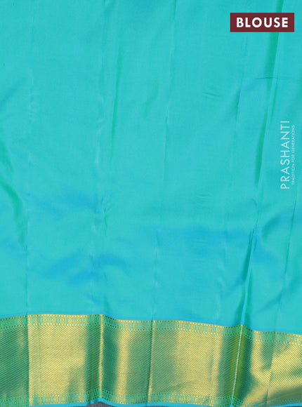 Pure kanchipuram silk saree dark magenta and teal blue with allover zari woven brocade weaves and long zari woven border