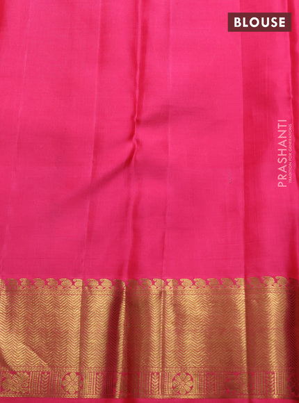 Pure kanchipuram silk saree mustard yellow and pink with allover floral self emboss pattern and long annam zari woven border