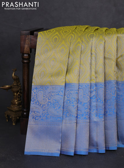 Pure kanchipuram silk saree lime yellow and blue with allover zari woven self emboss pattern and long paisley zari woven border