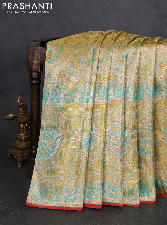 Pure kanchipuram tissue silk saree gold and mustard yellow with allover zari woven broacde weaves and zari woven border