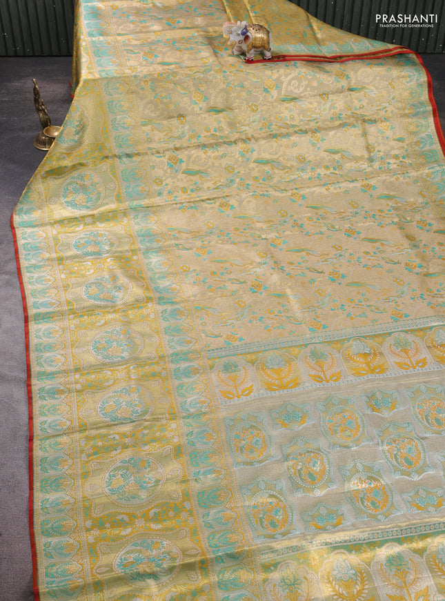 Pure kanchipuram tissue silk saree gold and mustard yellow with allover zari woven broacde weaves and zari woven border