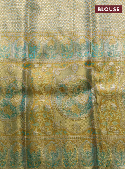 Pure kanchipuram tissue silk saree gold and mustard yellow with allover zari woven broacde weaves and zari woven border