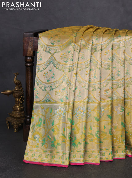 Pure kanchipuram tissue silk saree gold and green with allover zari woven broacde weaves and zari woven border