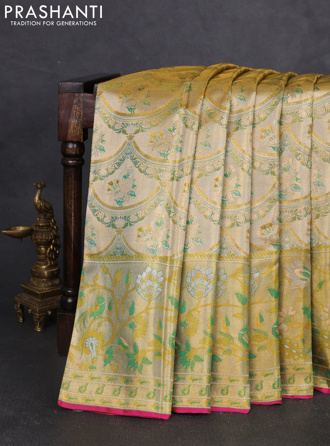 Pure kanchipuram tissue silk saree gold and green with allover zari woven broacde weaves and zari woven border