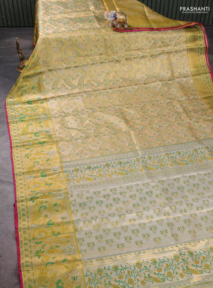 Pure kanchipuram tissue silk saree gold and green with allover zari woven broacde weaves and zari woven border