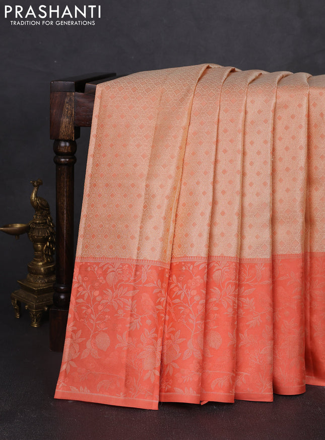 Pure kanchipuram silk saree cream and peach shade with allover self emboss pattern and long rich zari woven border