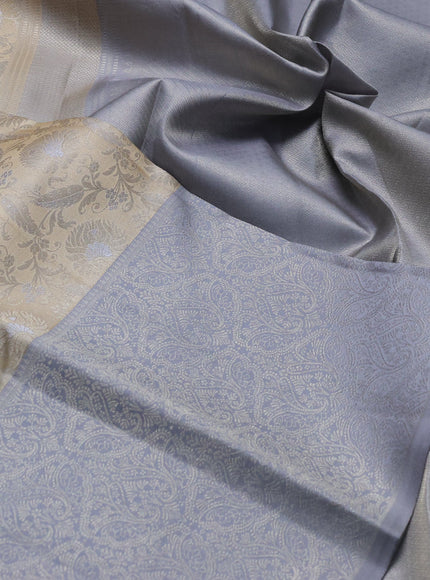 Pure kanchipuram silk saree beige and grey with allover floral self emboss pattern and long rich zari woven border