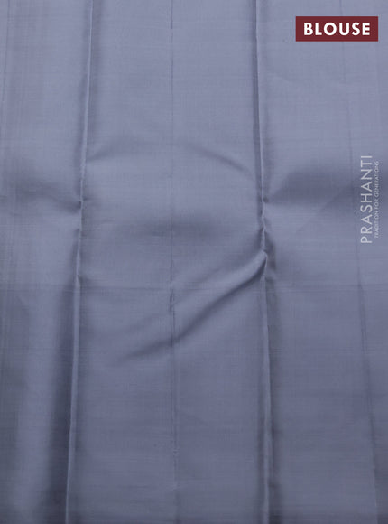 Pure kanchipuram silk saree beige and grey with allover floral self emboss pattern and long rich zari woven border