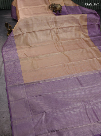Pure kanchipuram silk saree beige and pastel purple with allover self emboss pattern and rich paisley zari woven border