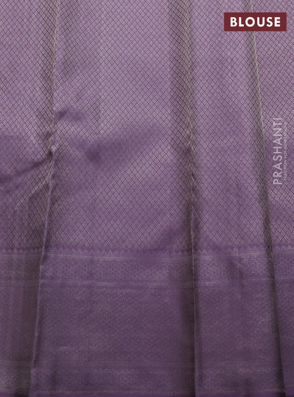 Pure kanchipuram silk saree beige and pastel purple with allover self emboss pattern and rich paisley zari woven border