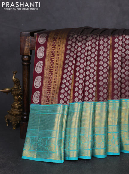 Pure kanchipuram silk saree wine shade and teal blue with allover silver & gold zari woven brocade weaves and long zari woven border