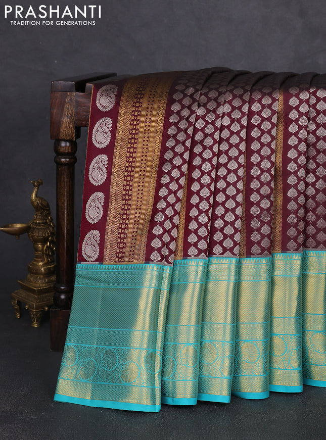 Pure kanchipuram silk saree wine shade and teal blue with allover silver & gold zari woven brocade weaves and long zari woven border
