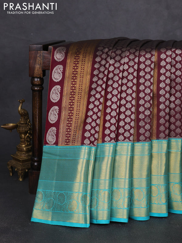 Pure kanchipuram silk saree wine shade and teal blue with allover silver & gold zari woven brocade weaves and long zari woven border