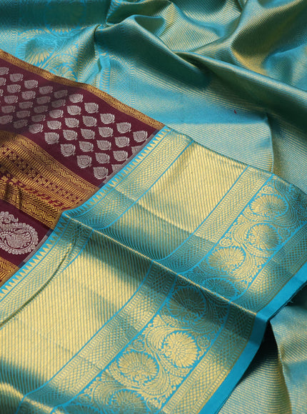 Pure kanchipuram silk saree wine shade and teal blue with allover silver & gold zari woven brocade weaves and long zari woven border