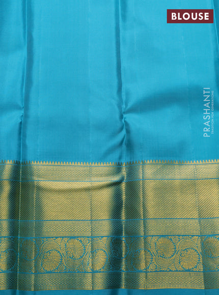 Pure kanchipuram silk saree wine shade and teal blue with allover silver & gold zari woven brocade weaves and long zari woven border