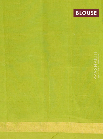 Semi silk cotton saree bottle green and light green with zari woven buttas and zari woven border