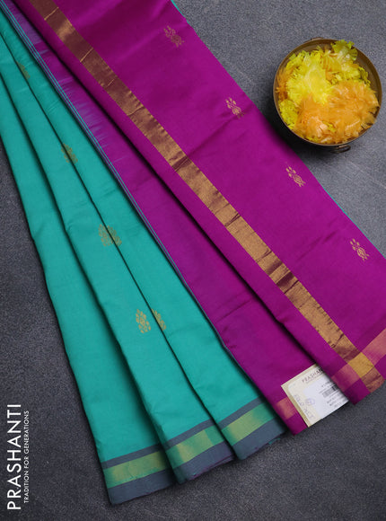 Semi silk cotton saree teal green and purple with zari woven buttas and zari woven border