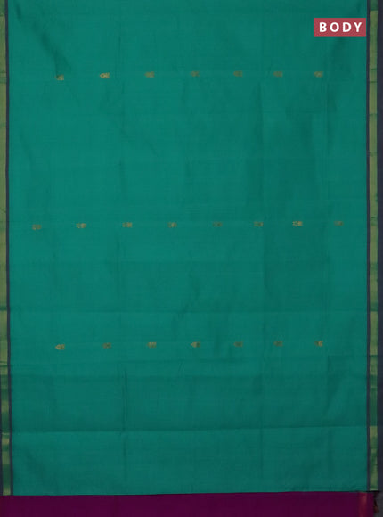 Semi silk cotton saree teal green and purple with zari woven buttas and zari woven border