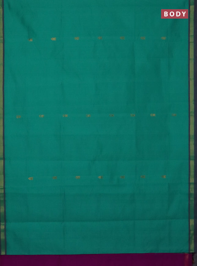 Semi silk cotton saree teal green and purple with zari woven buttas and zari woven border