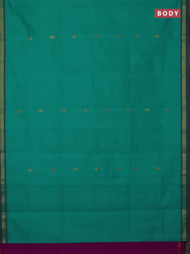 Semi silk cotton saree teal green and purple with zari woven buttas and zari woven border