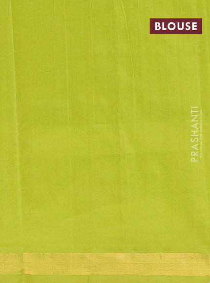 Semi silk cotton saree light green and red with allover zari woven buttas and zari woven border