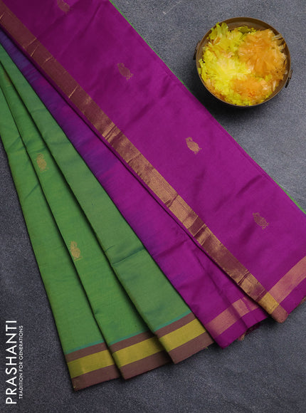 Semi silk cotton saree light green and purple with allover zari woven buttas and zari woven border