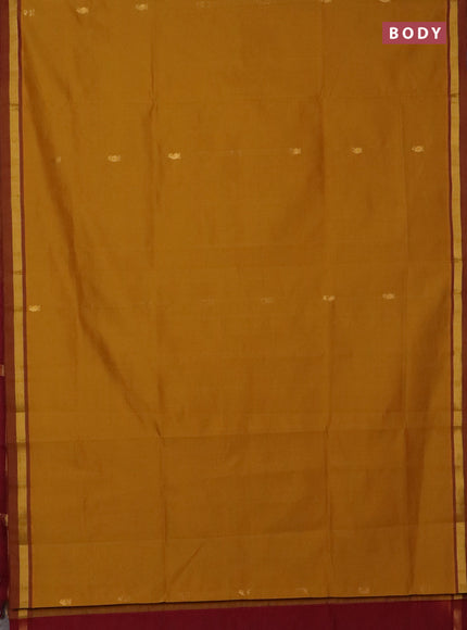 Semi silk cotton saree dark mustard and maroon with allover zari woven buttas and zari woven border