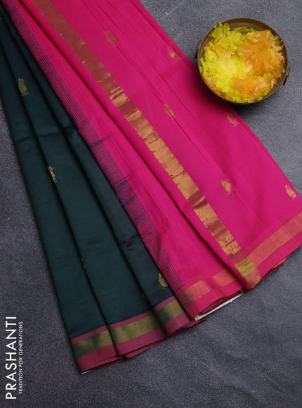 Semi silk cotton saree bottle green and pink with zari woven buttas and zari woven border