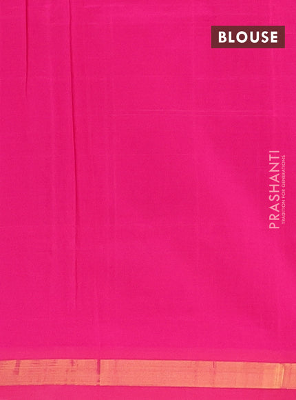 Semi silk cotton saree bottle green and pink with zari woven buttas and zari woven border