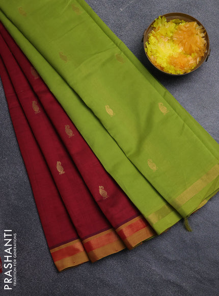 Semi silk cotton saree maroon and light green with zari woven buttas and zari woven border