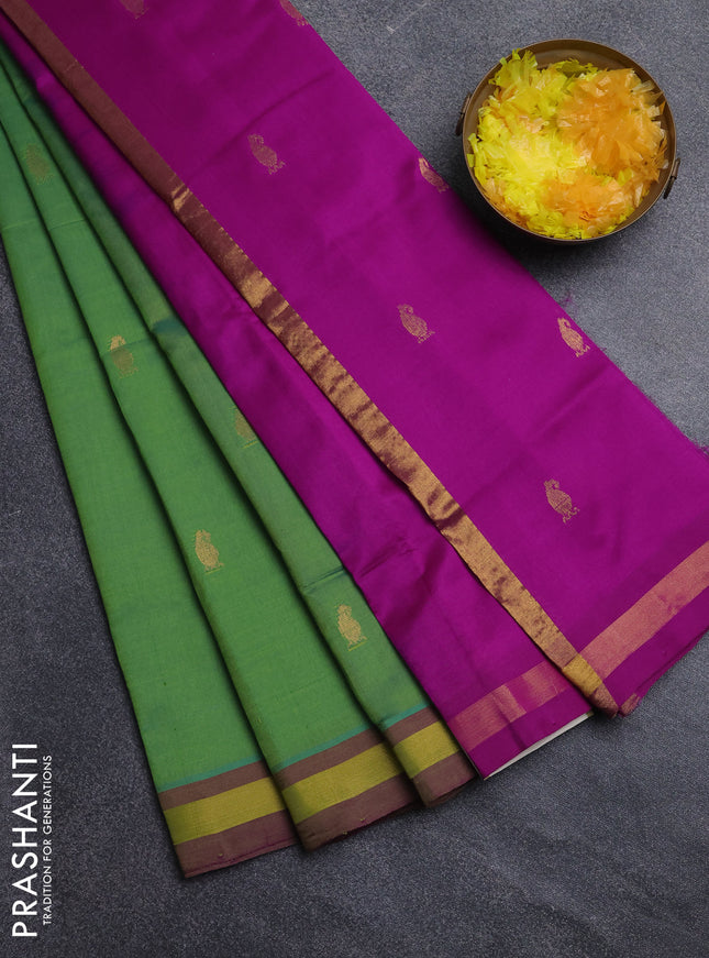 Semi silk cotton saree light green and pink with zari woven buttas and zari woven border