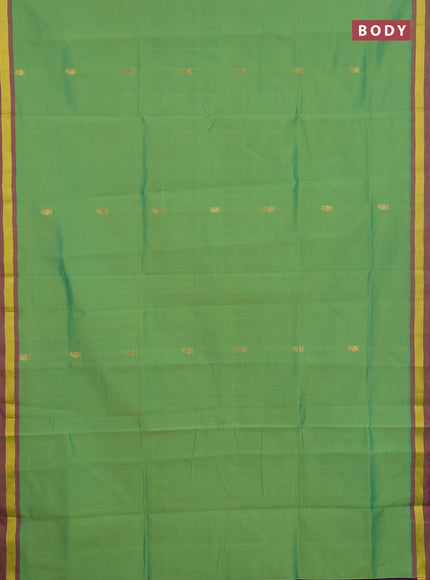 Semi silk cotton saree light green and pink with zari woven buttas and zari woven border