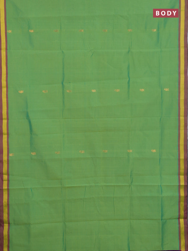 Semi silk cotton saree light green and pink with zari woven buttas and zari woven border