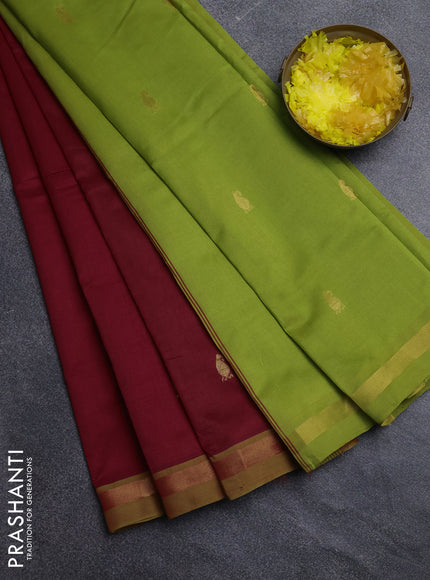 Semi silk cotton saree red and light green with zari woven buttas and zari woven border