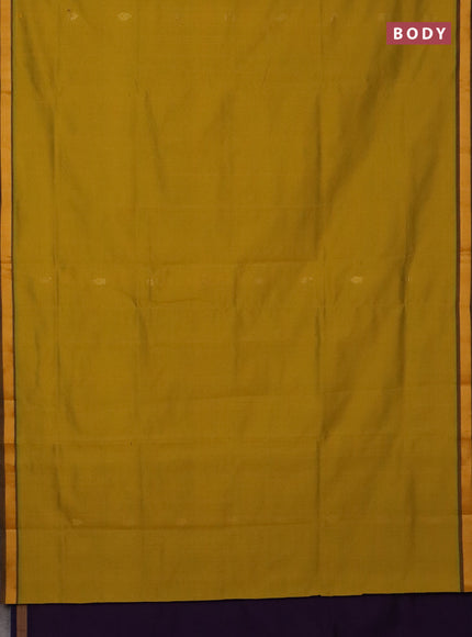 Semi silk cotton saree yellow and purple with plain body and zari woven border