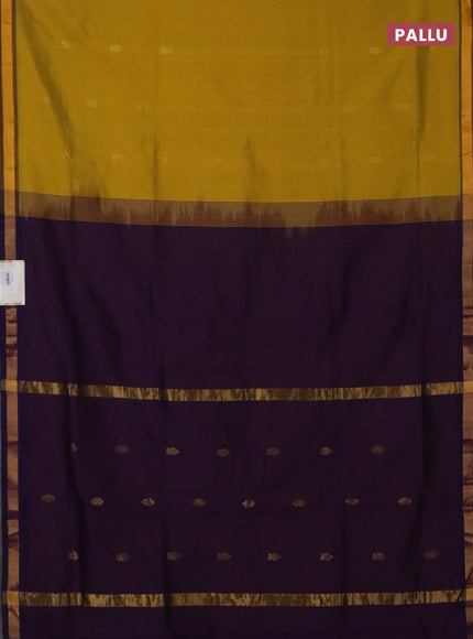 Semi silk cotton saree yellow and purple with plain body and zari woven border