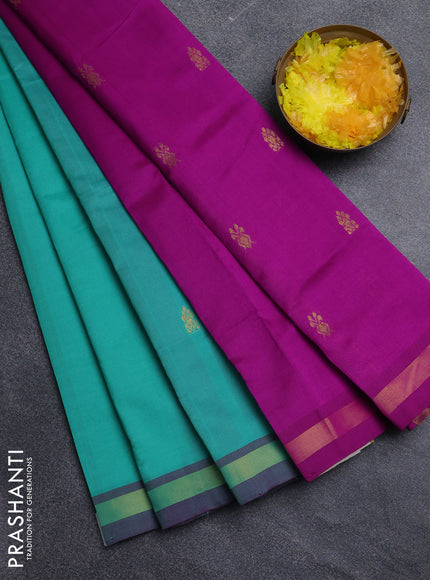 Semi silk cotton saree teal green and magenta pink with zari woven buttas and zari woven border