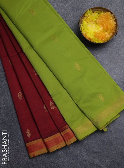 Semi silk cotton saree deep maroon and light green with zari woven buttas and zari woven border