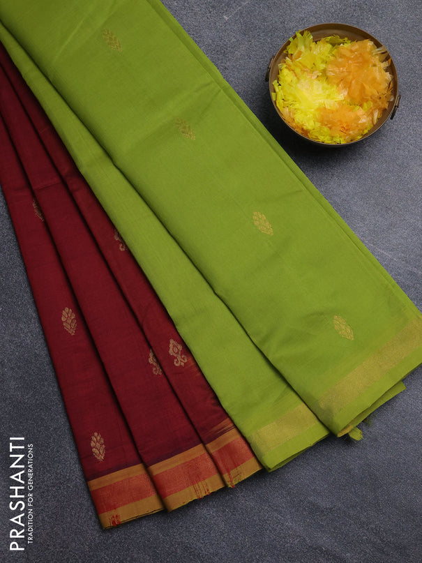 Semi silk cotton saree deep maroon and light green with zari woven buttas and zari woven border